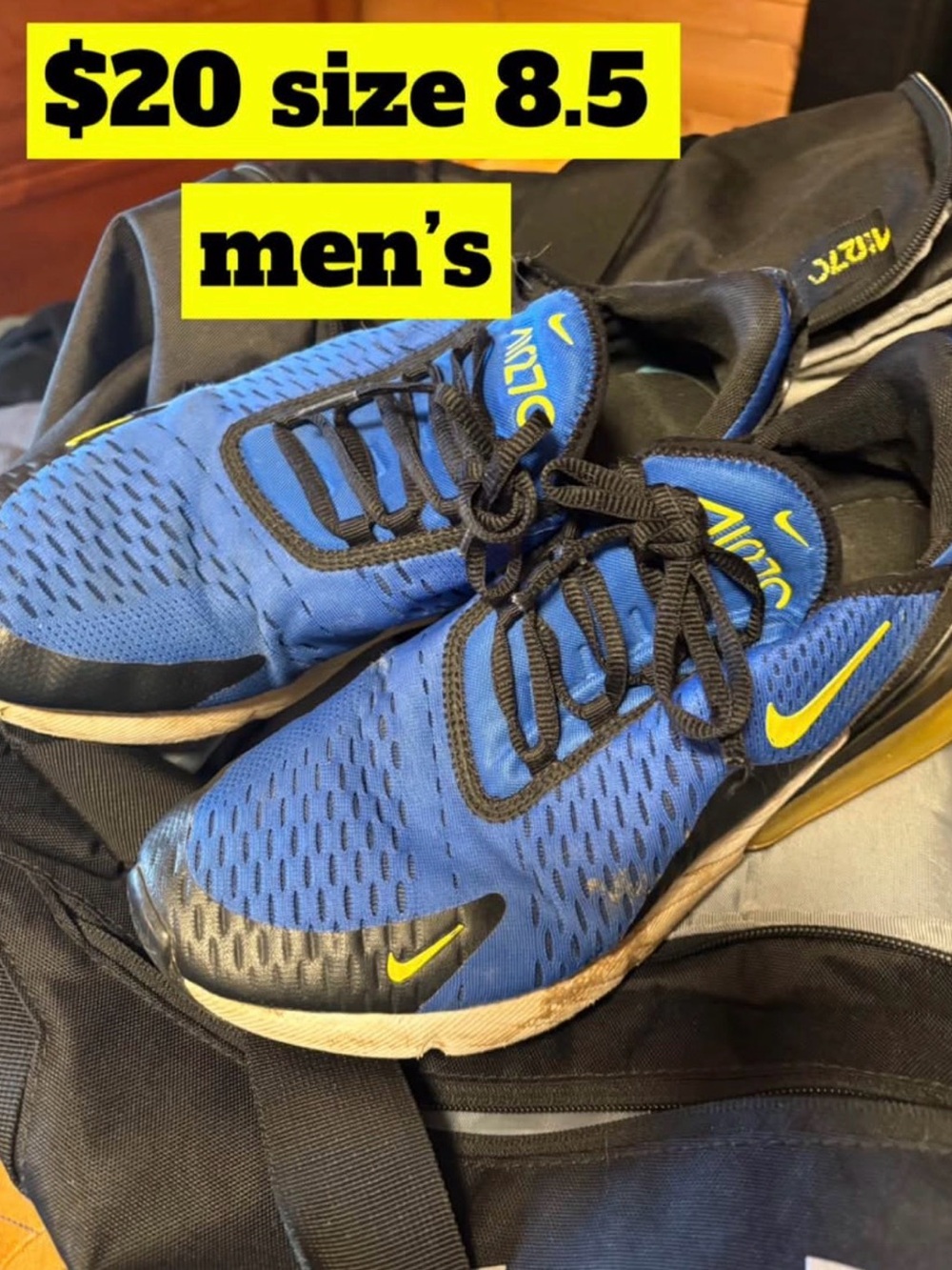 Nike blue running shoes with yellow Swoosh